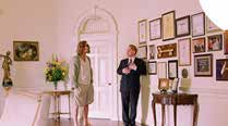 A scene from The Big Lebowski featuring Philip Seymour Hoffman and Jeff Bridges in the mansion’s breakfast room