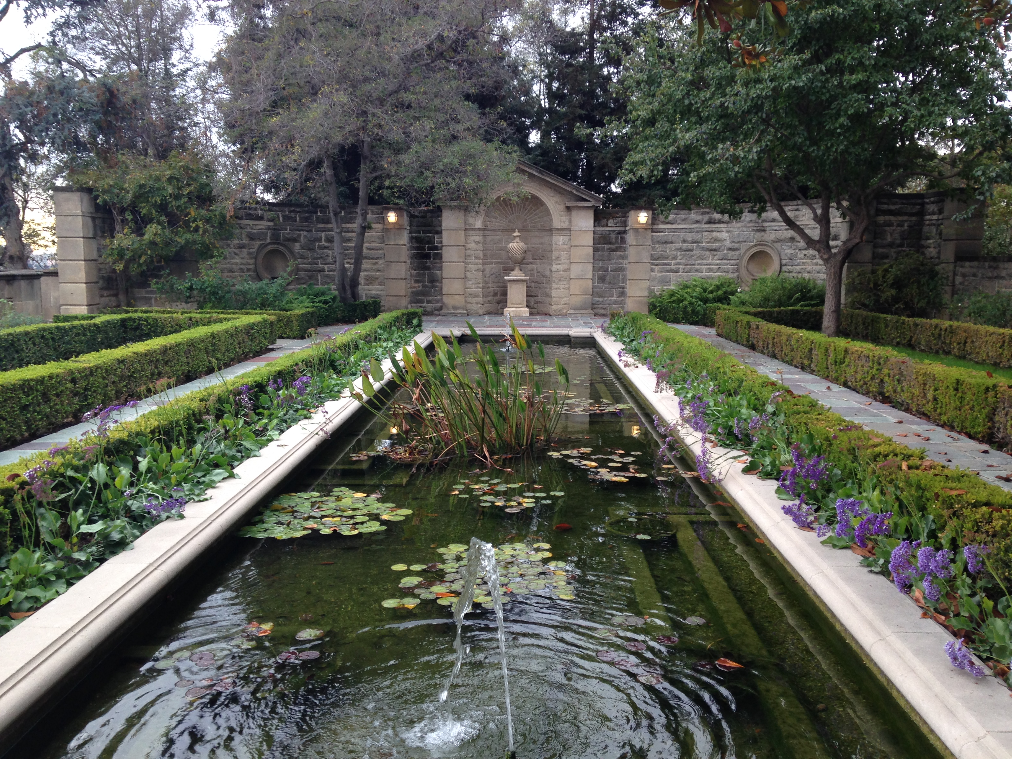 The formal gardens and reflecting pool at Greystone Mansion